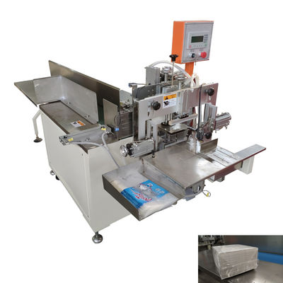 Máquina de embalagem e vedação de tecido de papel